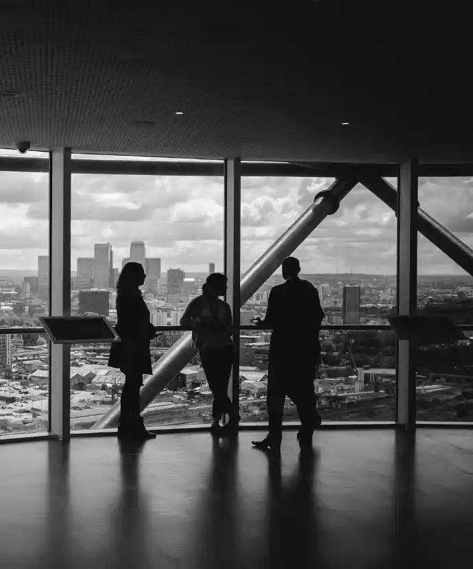 people standing inside city building
