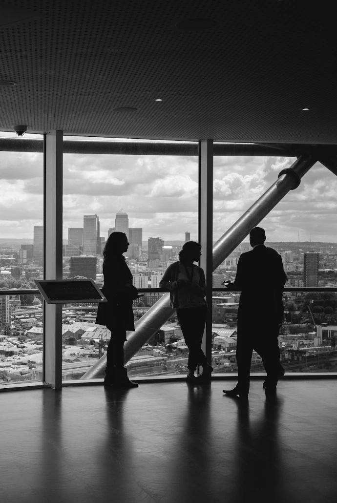 people standing inside city building
