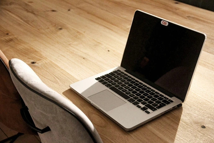 macbook pro on white table